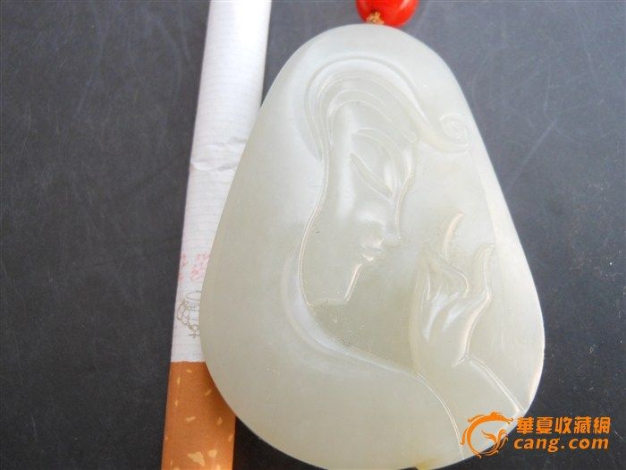 新疆和田玉籽料苏工精雕侧脸观音43克带证!图3