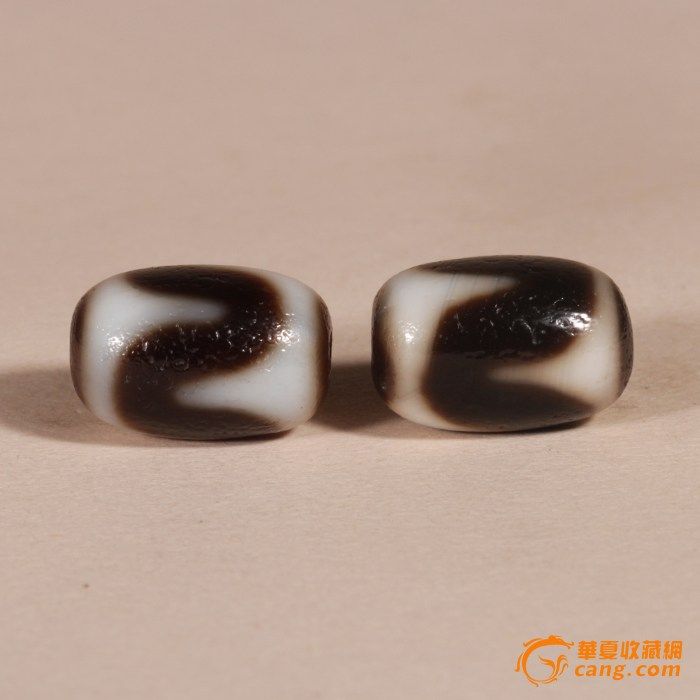 藏式虎牙天珠一对_在线拍卖_在线拍卖网_艺术品拍卖_古玩拍卖_华夏收藏网